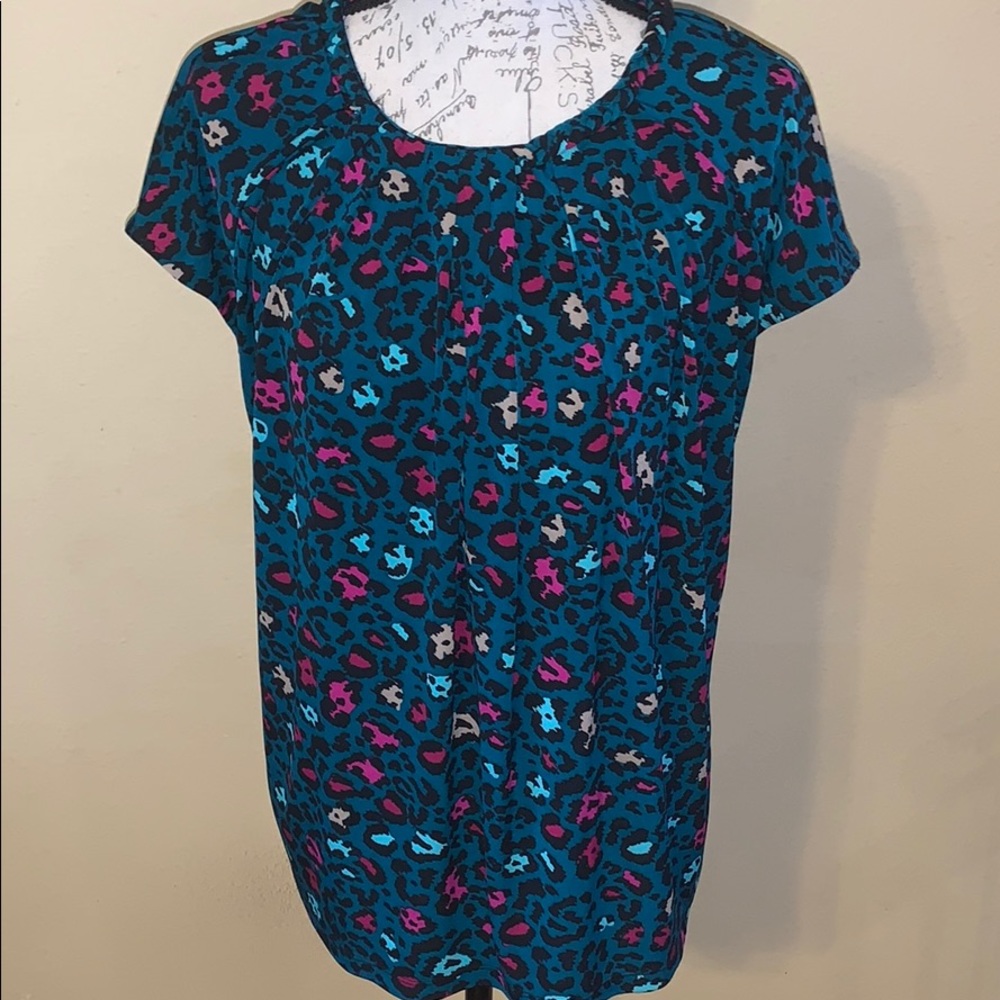 Beautiful braided neck line blouse.